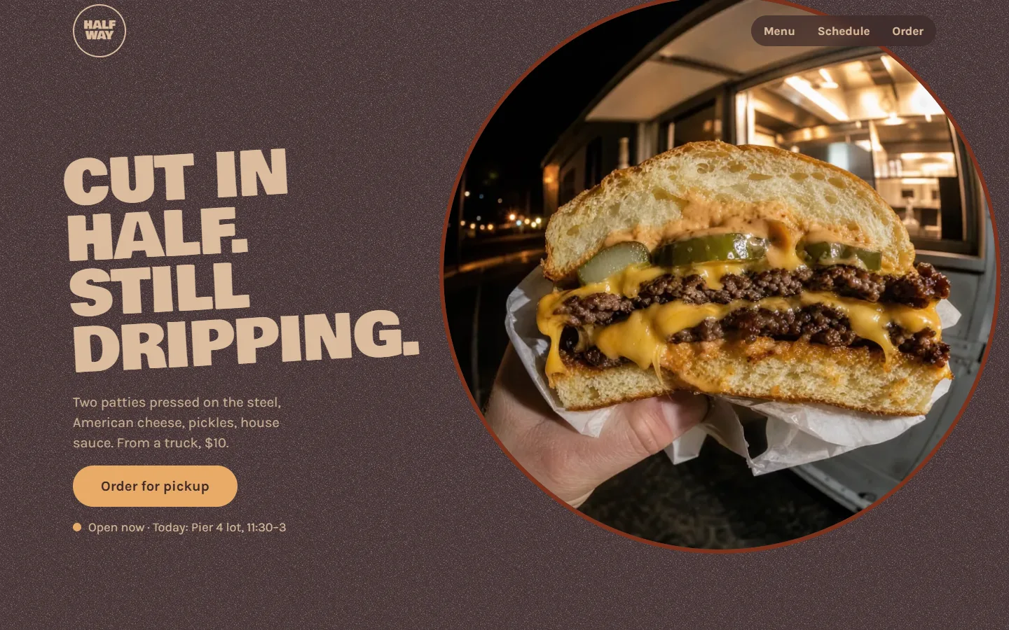 Halfway, made with Off-Template: char-brown page, a tilted heavy headline, and a round fisheye photo of a burger cut in half in front of the food truck